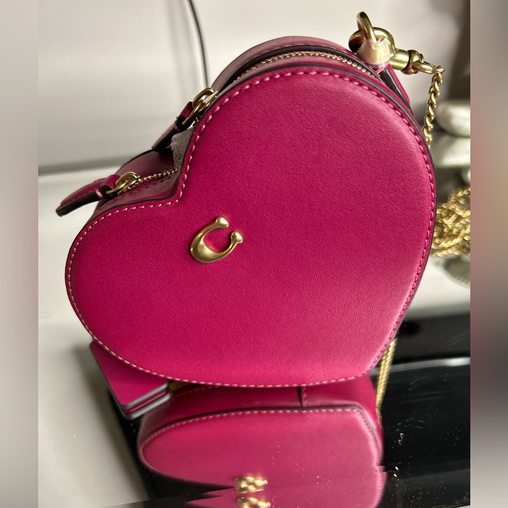 Coach Mini heart crossbody purse.